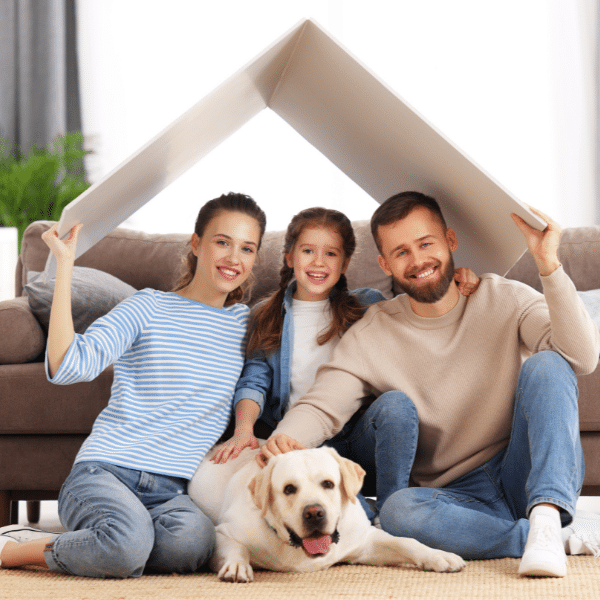 Happy Utah family celebrating successful home sale